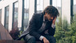 © Yuliia - Suffering anxious worried irritated Indian business man feeling bad headache frustrated problem businessman employer manager entrepreneur in city outdoors thinking about corporate trouble headache
