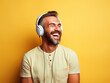 © DesiArt - Happy man listening to music portrait on isolated background - ai generative