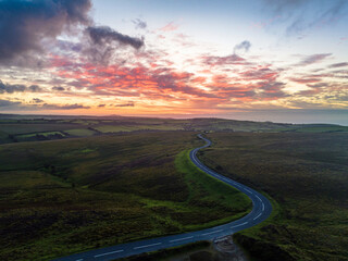 Wall Mural - Sunset over Moorland and Farms from a drone, Exmoor National Park, Devon, England, Europe