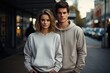 © Philipp - Stylish Couple in Urban Chic Hoodies on City Street