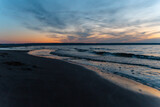 Fototapeta Morze - Sea waves at sunset, natural landscape