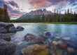© Travel 'n' Lifestyle - View of Lake Moraine at sunset, a beautiful lake with mountains and snow in Banff National Park, Alberta, Canada.