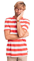 Sticker - Handsome caucasian man with beard wearing casual clothes and glasses thinking looking tired and bored with depression problems with crossed arms.