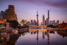 View Of Shanghai Skyline At Night, View Of The Financial District Along The Huangpu River, China.