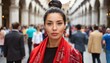 © Marko - woman in ponytail, red shawl, serious expression in diverse crowd
