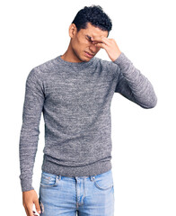 Sticker - Hispanic handsome young man wearing casual sweater tired rubbing nose and eyes feeling fatigue and headache. stress and frustration concept.