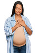 Beautiful hispanic woman expecting a baby showing pregnant belly smiling with hands on chest with closed eyes and grateful gesture on face. health concept.