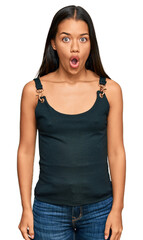 Sticker - Beautiful hispanic woman wearing casual clothes scared and amazed with open mouth for surprise, disbelief face