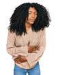 © Krakenimages.com - Young african american girl wearing casual clothes with hand on stomach because indigestion, painful illness feeling unwell. ache concept.