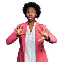 Sticker - African american woman with afro hair wearing business jacket afraid and terrified with fear expression stop gesture with hands, shouting in shock. panic concept.