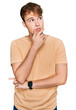 Young caucasian man wearing casual clothes thinking worried about a question, concerned and nervous with hand on chin