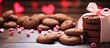 Valentine's Day treat: Chocolate cookies and hearts cooling on counter.