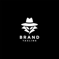 Mysterious Alien In White Logo. Alien Wearing Hat And Coat Logo Design.
