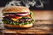 massive and delicious looking  steamy hamburger on wooden board