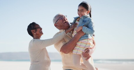 Canvas Print - Running child, grandpa and hug with grandmother at a beach for tickle, fun or games in nature together. Love, happy family and senior man embrace girl at the ocean for vacation, travel or sea holiday