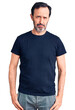 © Krakenimages.com - Middle age handsome man wearing casual t-shirt depressed and worry for distress, crying angry and afraid. sad expression.