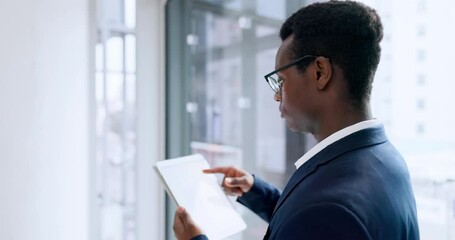 Fototapete - Businessman, tablet and research at office for communication, social media or networking by window. Black man or employee with technology for online search, browsing or schedule planning at workplace