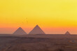 The Great Pyramids of Egypt at dawn.