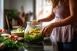 woman tossing salad to pair with smoked chicken meal
