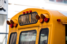 Bright Yellow School Bus On City Street