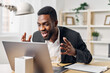 © SHOTPRIME STUDIO - man online computer student education laptop office american communication job african freelancer