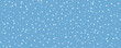 White snow falling on sky blue background seamless pattern. Flat style snowfall repeating texture for christmas greeting card or banner. 