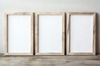Three blank canvases on wooden frames leaning against a wall. Wallart Mockup Concept. Ideal for art, creativity, and DIY projects
