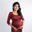 Pregnant woman giving happy expression on white background.