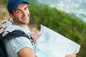 Canvas Print - Man, hiking and map for direction, portrait and guide on trail, fitness and exercise on holiday. Male person, smile and documents for information, travel and journey or adventure in nature for cardio