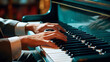 Closeup of hands playing piano