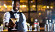 young male bartender serving martini cocktail with bar in background