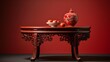 a red table with some chinese decoration