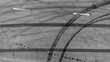 Aerial top view car tire marks burnout, Tire marks on the asphalt road, Tire mark on race track texture and background.