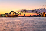 Sydney. New South Wales. Australia. The Opera House at sunset and the harbour bridge
