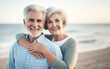 © nana - elderly couple Happily embracing each other by the sea The concept of love until old age healthy old people romantic