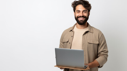 Poster - Man with brown hair, wearing a beige jacket holding a laptop, against grey background.