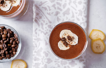 Wall Mural - Coffee banana smoothie in a glass