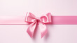 Pink ribbon bow holiday background.