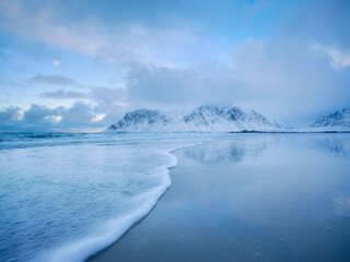 Wall Mural - mountains, beach and wave. skagsanden beach, lofoten islands, norway. winter landscape near the ocea