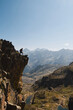 © Larraend Fotografía - Mountaineer enjoys the spectacular cliff precipice in the Pyrenees in summer