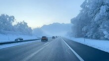 Time lapse of drive on highway in the morning, beautiful winter landscape, Vorarlberg, Austria.