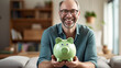 Man holding Piggy bank with a blurred background