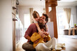 © Geber86 - Happy young dad having fun with his kids on the floor at home