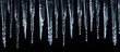 Sharp icicles isolated on black background. Copyspace image. Header for website template