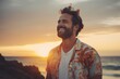 © Fotograf - A man with a beard smiling at the sunset. Perfect for capturing a joyful and peaceful moment. Ideal for advertisements, lifestyle blogs, and inspirational content