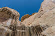 Stain-streaked white sand stone rock face in El Morro National Monument, New Mexico