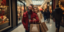 Two People Couple Man And Woman Happy Ehcited Holding Shopping Paper Bags, Pleased With Mall Discounts, Good Purchases. Indoor Studio Shot. Shopping And Sale Concept. Black Friday.