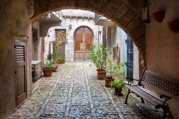 Canvas Print - Pedestrian Cobblestone Street in Erice - Sicily - Italy