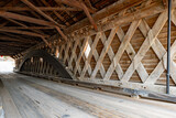 Fototapeta  - Interior image of historic timber one lane covered bridge in the Town of Newfield, Tompkins County NY.	