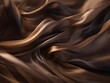 Abstract background of smooth flowing silk with soft wave of chocolate and black colors